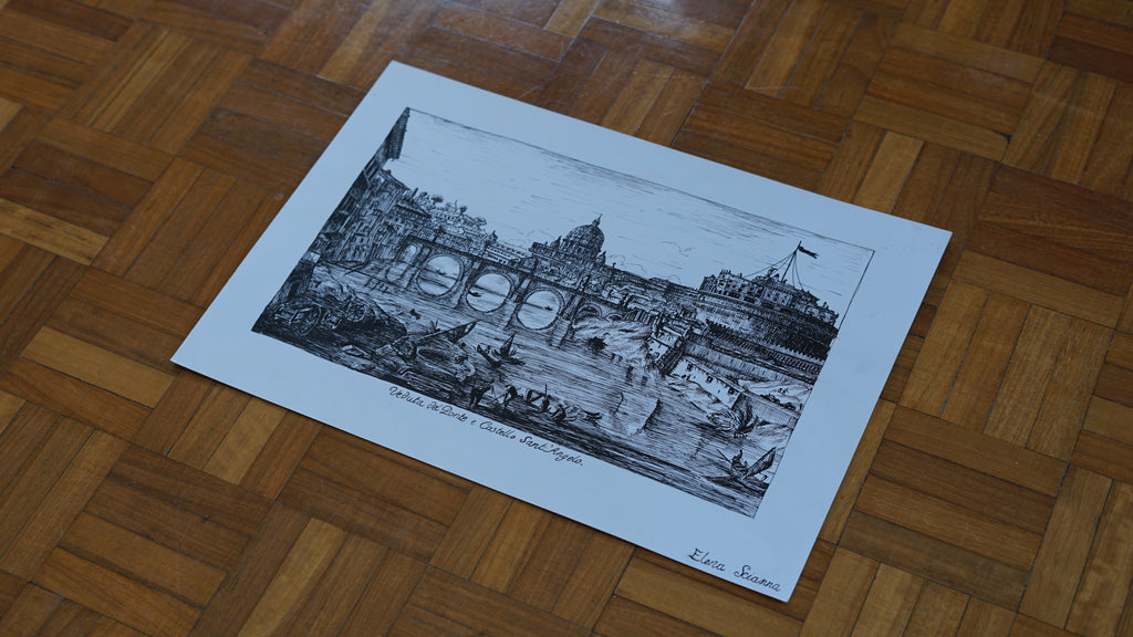 Black and white print of a cityscape on a wooden floor