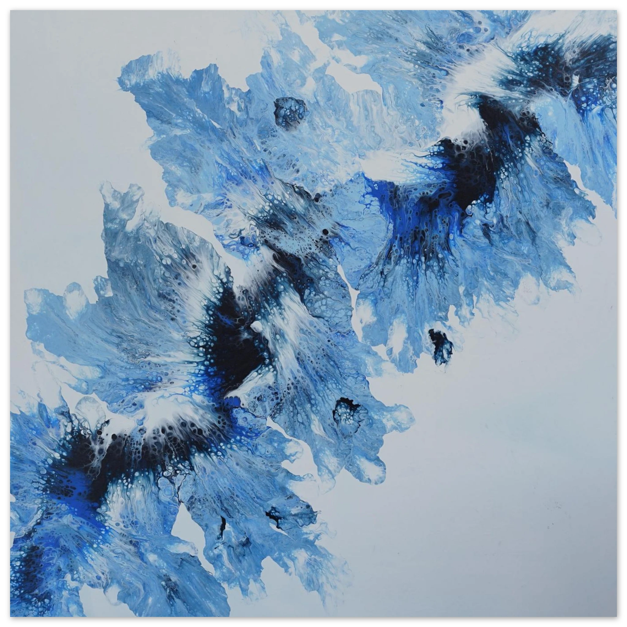 Abstract blue and black painting on a white canvas 